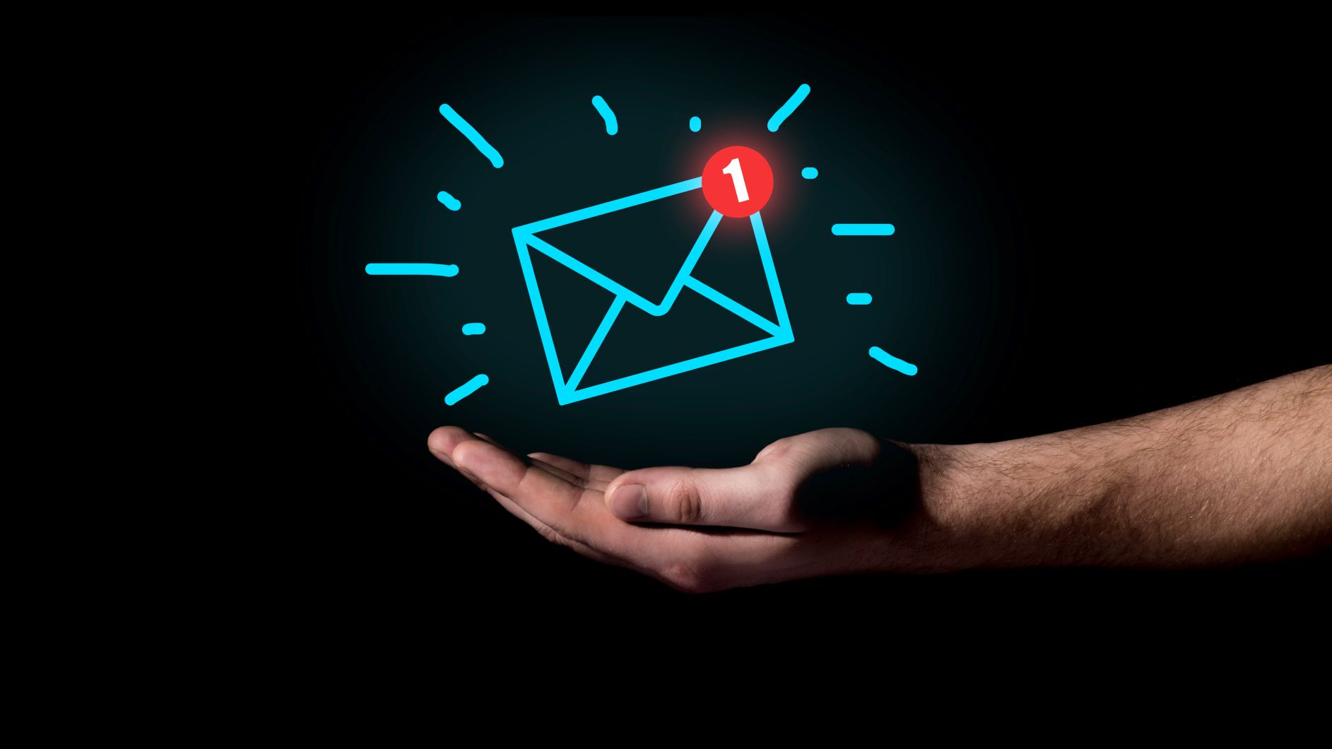 Hand holds email icon
